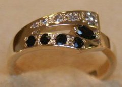 An IGI diamond report card with a 1.01 ct VS1 H round brilliant fitted to the cut-out window, certificate number F3E48487, sourced Antwerp.
